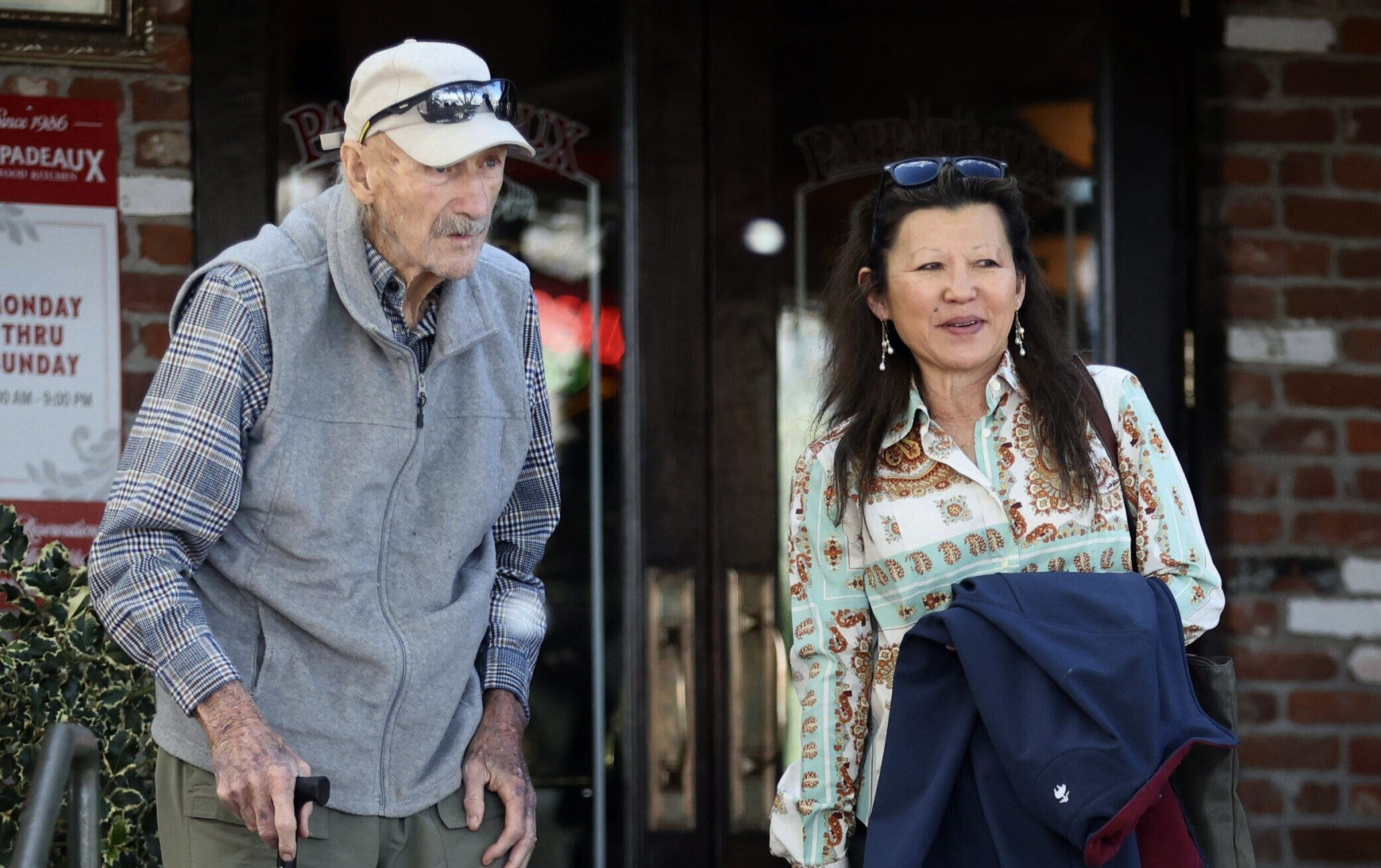 Actor Gene Hackman and his wife, classical pianist Betsy Arakawa, leave a restaurant in Santa Fe, New Mexico, on March 28, 2024. (Imago/Zuma Press/TNS)