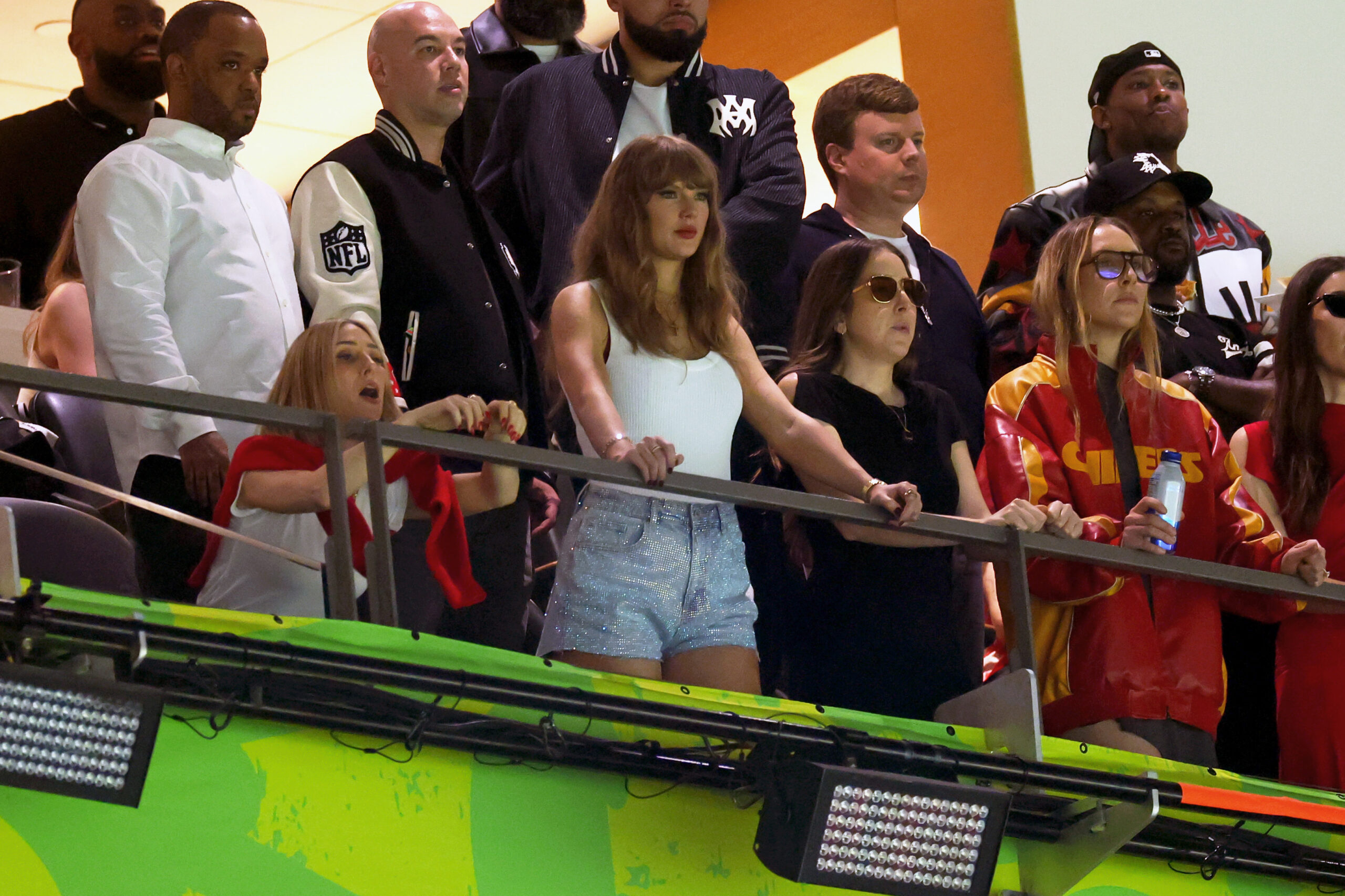 NEW ORLEANS, LOUISIANA - FEBRUARY 09: (L-R) Ashley Avignone, Taylor Swift, Alana Haim and Este Haim attend Super Bowl LIX at Caesars Superdome on February 09, 2025 in New Orleans, Louisiana. (Photo by Gregory Shamus/Getty Images)