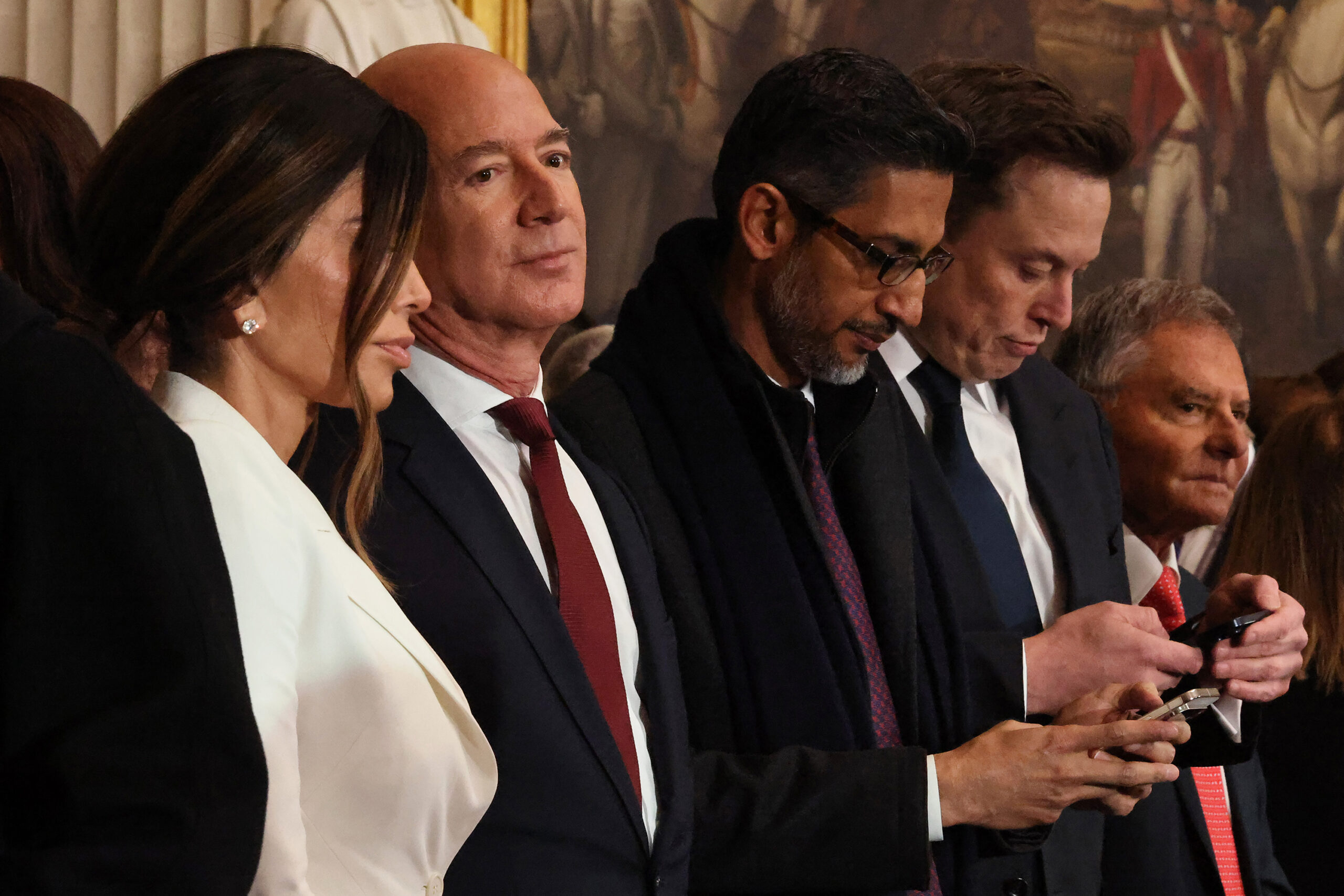 Lauren Sanchez, Founder of Amazon and Blue Origin Jeff Bezos, CEO of Google Sundar Pichai and Tesla, SpaceX and X CEO Elon Musk attend the inauguration of U.S. President-elect Donald Trump in the Rotunda of the U.S. Capitol on Monday, Jan. 20, 2025, in Washington, D.C. (Chip Somodevilla/CNP/ZUMA Press/TNS)