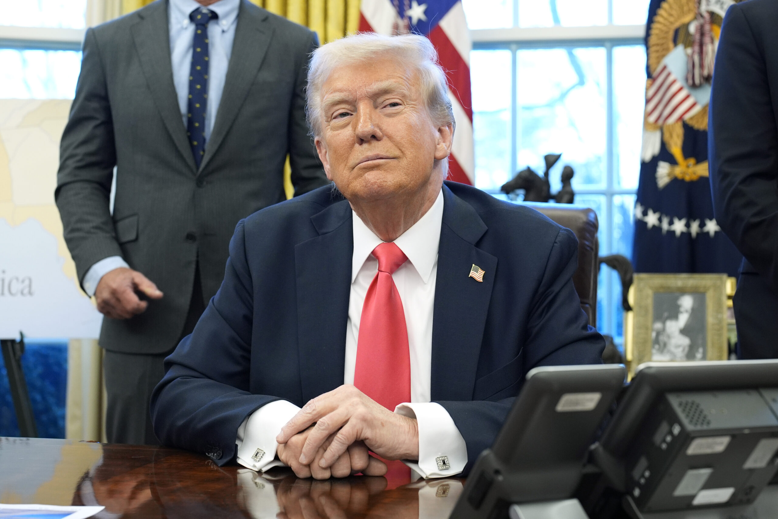 U.S. President Donald Trump speaks to reporters after signing executive orders in the Oval Office of the White House in Washington, D.C., on Tuesday, Feb. 25, 2025. (Yuri Gripas/Abaca Press/TNS)