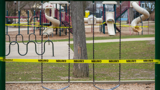 A school playground is sealed off with cordon tape