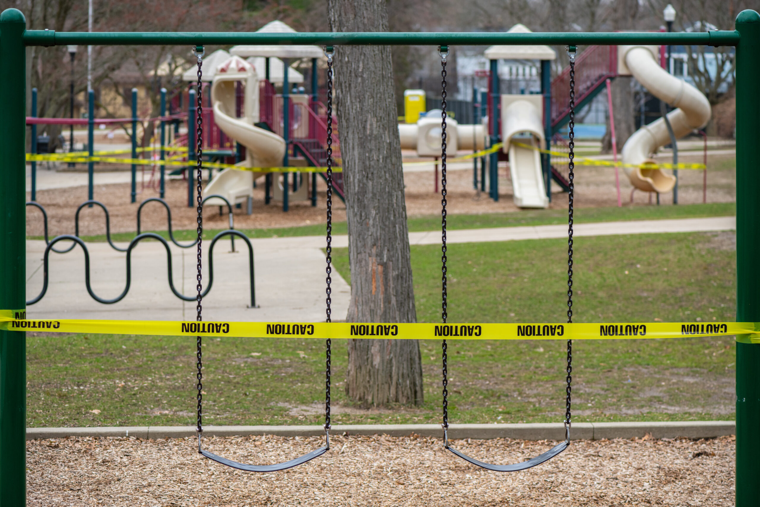 A school playground is sealed off with cordon tape