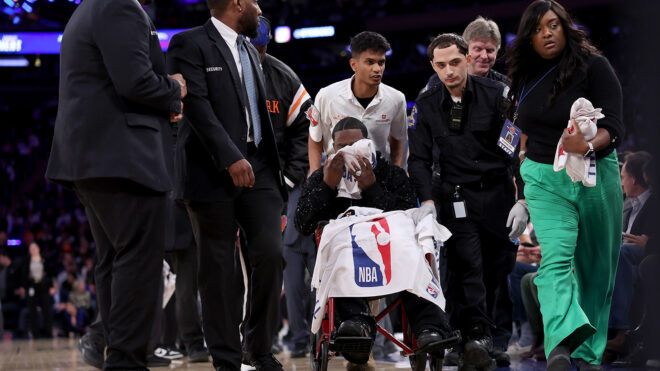 Comedian and actor Tracy Morgan is taken off the court by medical staff in the third quarter of the game between the New York Knicks and the Miami Heat at Madison Square Garden on March 17, 2025, in New York. The New York Knicks defeated the Miami Heat, 116-95. (Elsa/Getty Images/TNS)