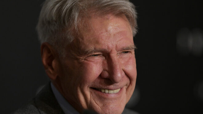 Harrison Ford smiles during a press conference for the film "Indiana Jones and the Dial of Destiny" at the 76th annual Cannes Film Festival in Cannes, France, on May 19, 2023. (Stefano Rellandini/AFP via Getty Images/TNS)