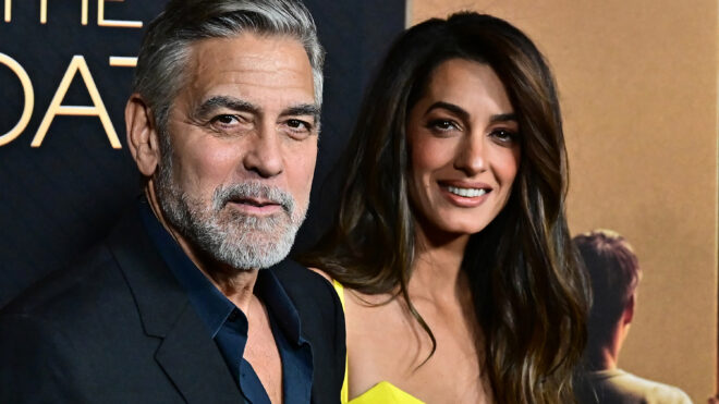 George Clooney and his wife Lebanese-British barrister Amal Clooney attend the L.A. premiere of Amazon MGM Studios' "The Boys in the Boat" at the Samuel Goldwyn theatre in Beverly Hills, California, Dec. 11, 2023. (Frederic J. Brown/AFP/Getty Images/TNS)