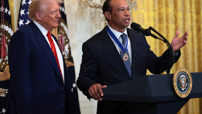 Gold legend Tiger Woods speaks alongside U.S. President Donald Trump during a reception honoring Black History Month in the East Room of the White House on Feb. 20, 2025, in Washington, D.C. (Win McNamee/Getty Images/TNS)