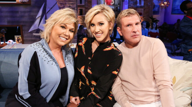 HOLLYWOOD GAME NIGHT -- "Chrisley's Believe It Or Not" Episode 606 -- Pictured: (l-r) Julie Chrisley, Savannah Chrisley, Todd Chrisley -- (Photo by: Vivian Zink/NBC/NBCU Photo Bank via Getty Images)