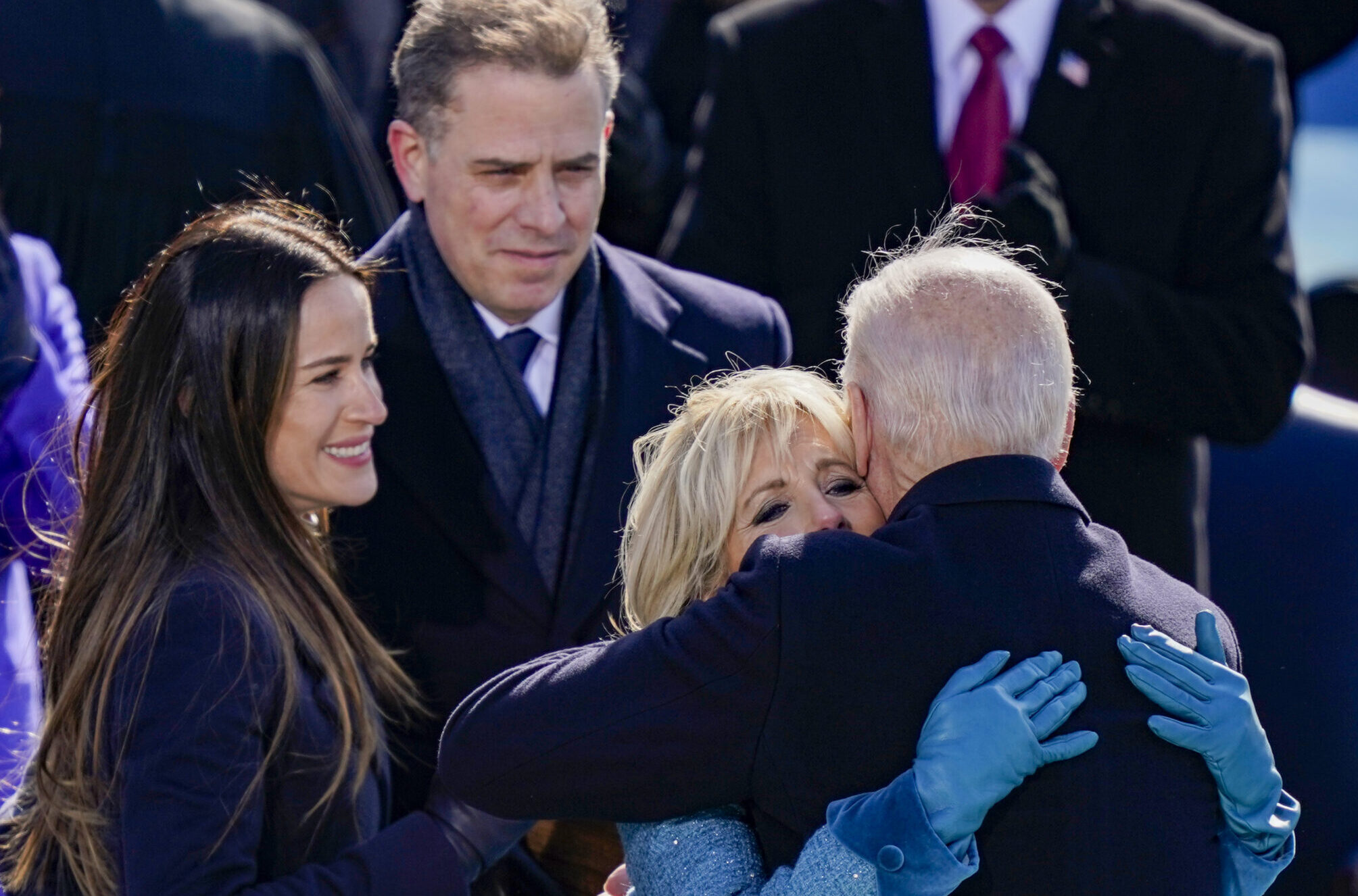 WASHINGTON, DC - JANUARY 20: U.S. President Joe Biden embraces his family First Lady Dr. Jill Biden, son Hunter Biden and daughter Ashley after being sworn in during his inauguation on the West Front of the U.S. Capitol on January 20, 2021 in Washington, DC. During today's inauguration ceremony Joe Biden becomes the 46th president of the United States. (Photo by Drew Angerer/Getty Images)