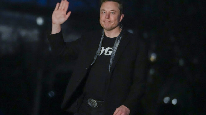 Elon Musk waves as he walks on the South Lawn of the White House after stepping off Marine One upon arrival to the White House in Washington, DC on March 9, 2025. (Photo by Oliver Contreras / AFP) (Photo by OLIVER CONTRERAS/AFP via Getty Images)