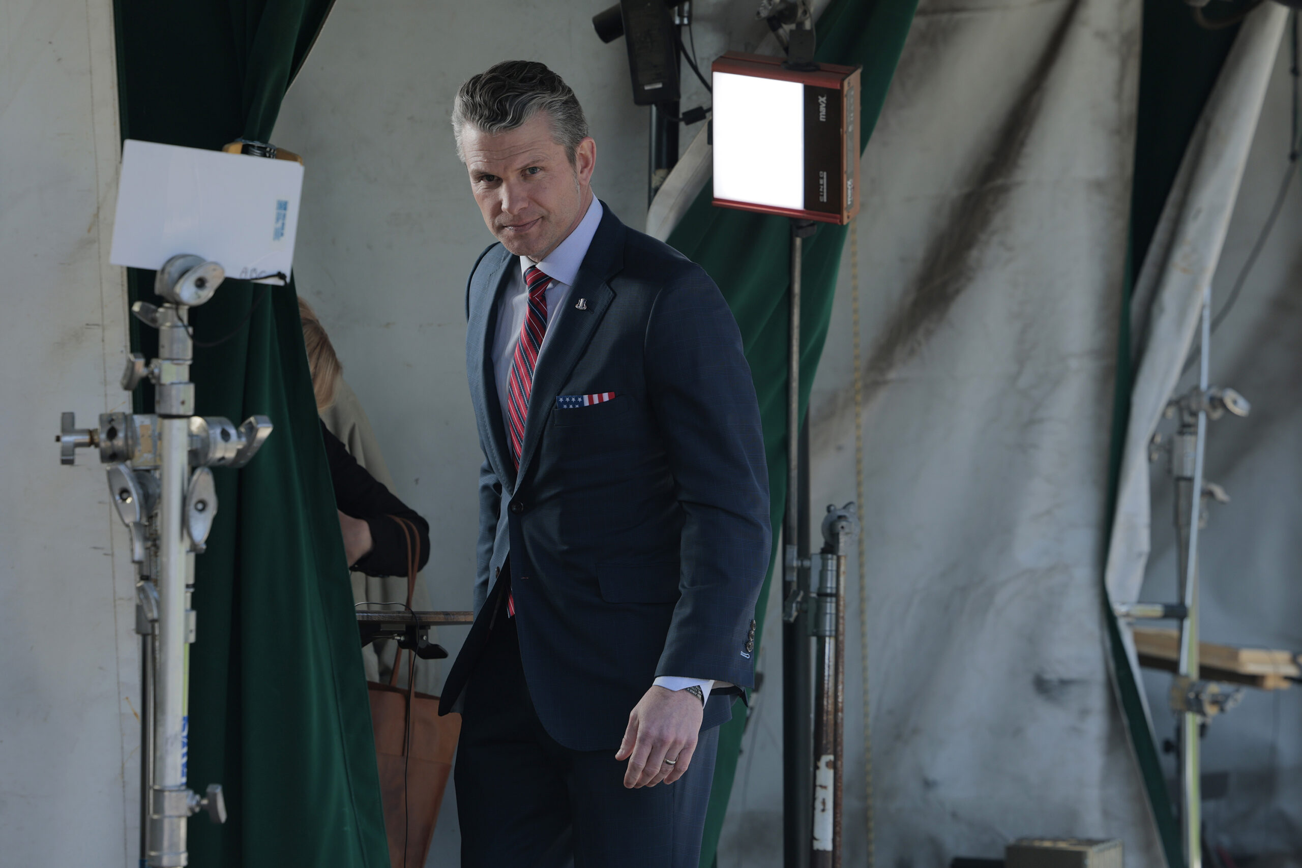 U.S. Secretary of Defense Pete Hegseth participates in a TV interview outside of the White House on March 21, 2025, in Washington, D.C. Hegseth visited the White House to join U.S. President Donald Trump in announcing the Next Generation of Air Dominance (NGDA) program, the F-47, the sixth-generation high-tech Air Force fighter to succeed the F-22 Raptor. (Anna Moneymaker/Getty Images/TNS)