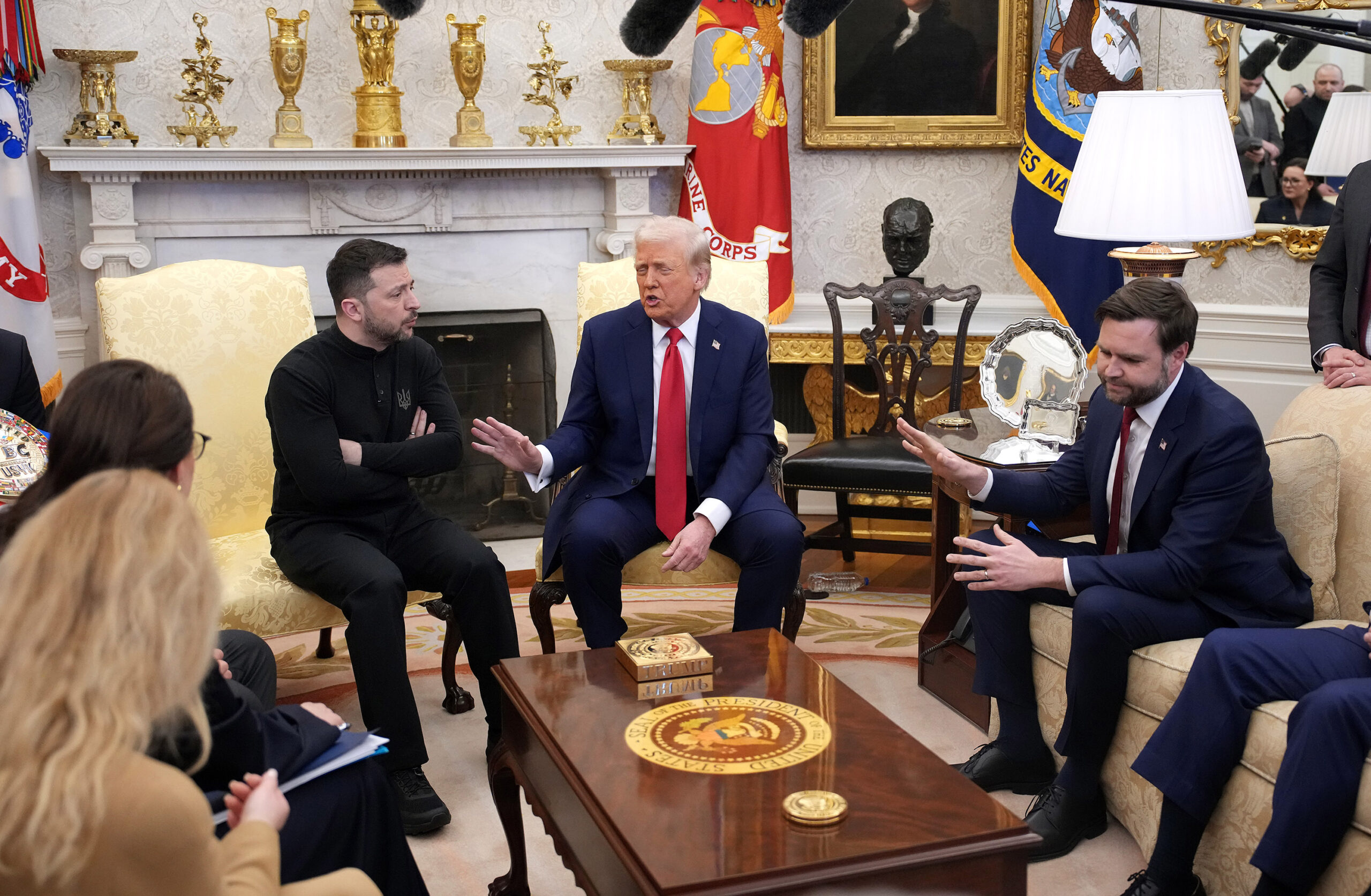 U.S. President Donald Trump, center, and Vice President J.D. Vance meet with Ukrainian President Volodymyr Zelensky, left, in the Oval Office at the White House on Feb. 28, 2025, in Washington, D.C. Trump and Zelensky are meeting today to negotiate a preliminary agreement on sharing Ukraine’s mineral resources that Trump says will allow America to recoup aid provided to Kyiv while supporting Ukraine’s economy. (Andrew Harnik/Getty Images/TNS)