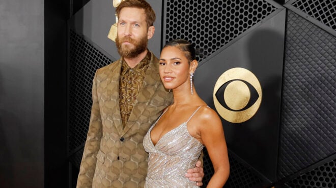 Calvin Harris, left, and Vick Hope arrive on the red carpet for the 66th Annual Grammy Awards at Crypto.com Arena in Los Angeles on Feb. 4, 2024. (Allen J. Schaben/Los Angeles Times/TNS)