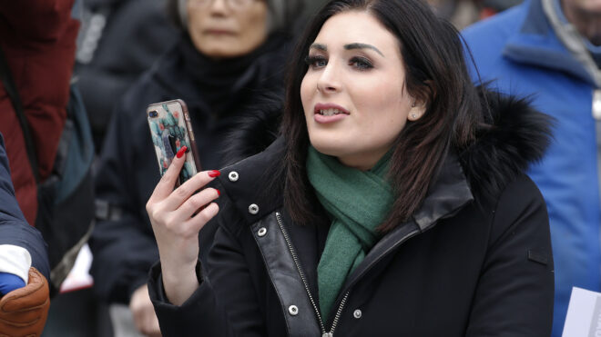 NEW YORK, NEW YORK - JANUARY 19: Political activist Laura Loomer stands across from the Women's March 2019 in New York City on January 19, 2019 in New York City. (Photo by John Lamparski/Getty Images)