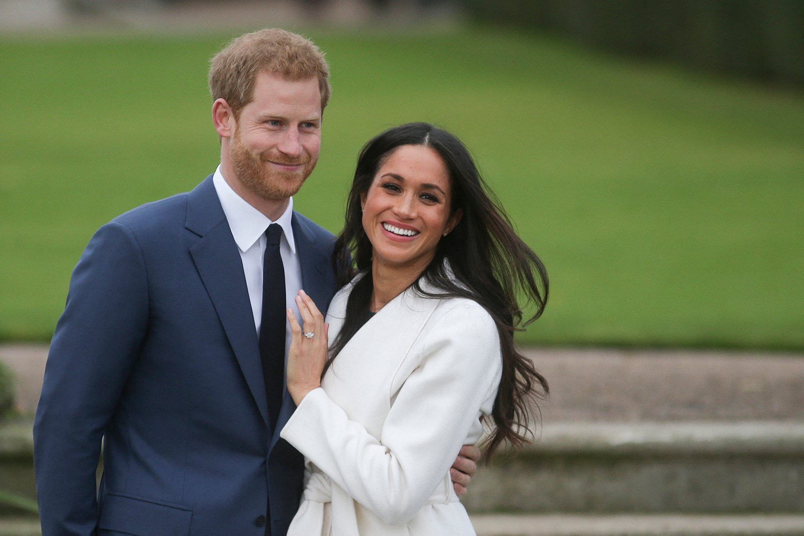 Britain’s Prince Harry and his fiancee Meghan Markle pose for photographers during a photocall in the grounds of Kensington Palace in London, Nov. 27, 2017. (Daniel Leal/AFP via Getty Images/TNS)