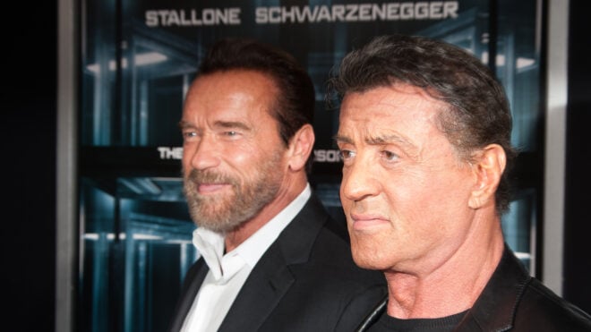 Arnold Schwarzenegger, left, and Sylvester Stallone attend the "Escape Plan" New York premiere at Regal E-Walk on Oct. 15, 2013, in New York City. (Dave Kotinsky/Getty Images/TNS)