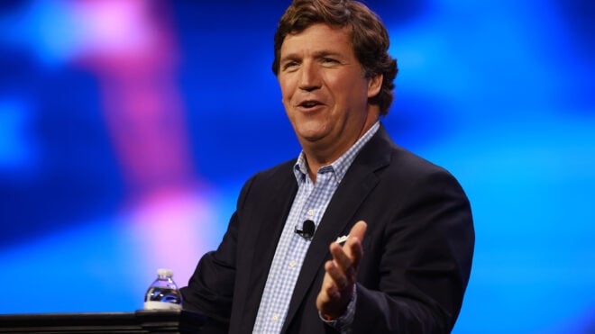 WEST PALM BEACH, FLORIDA - JULY 15: Tucker Carlson speaks at the Turning Point Action conference on July 15, 2023 in West Palm Beach, Florida. Trump is scheduled to speak at the event held in the Palm Beach County Convention Center. (Photo by Joe Raedle/Getty Images)