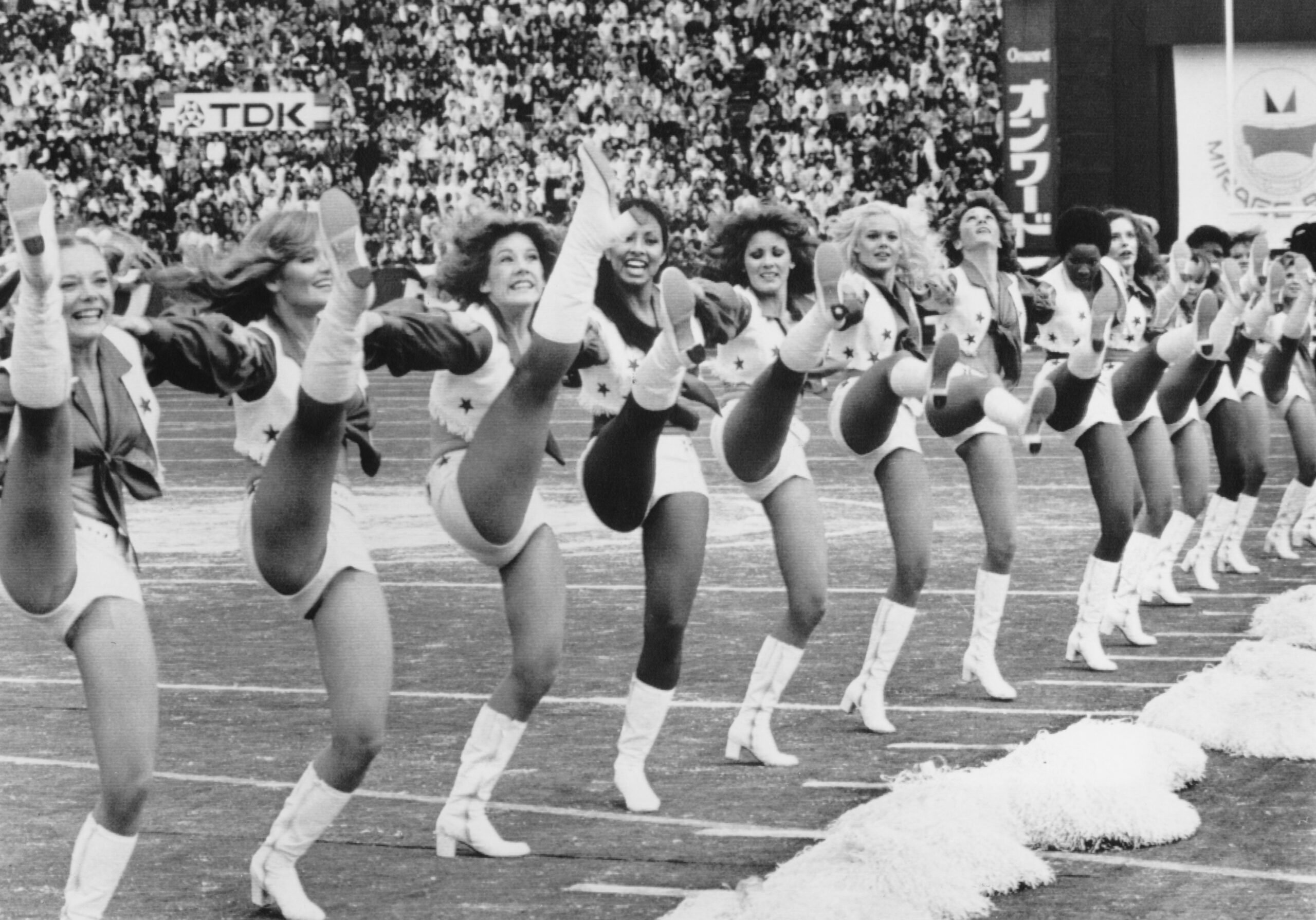 Dallas Cowboys cheerleaders perform at a game, United States, circa 1980. (Photo by Bettmann/Getty Images)