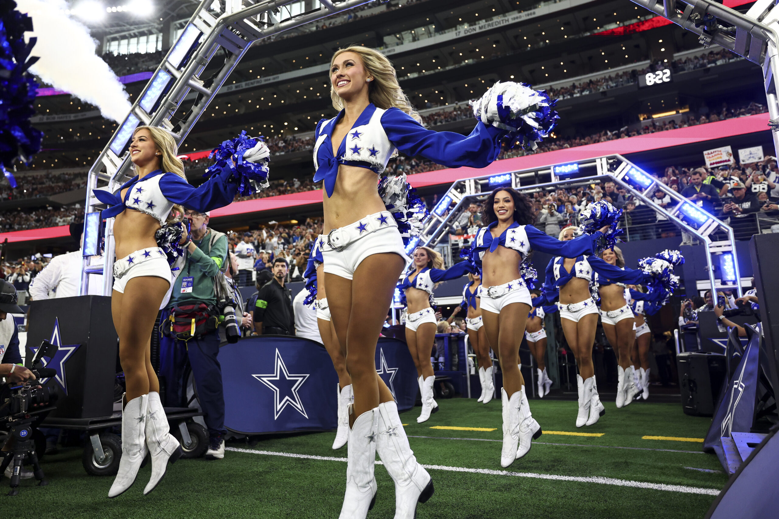 ARLINGTON, TX - NOVEMBER 23: Dallas Cowboys cheerleaders dance prior to an NFL football game against the Washington Commanders at AT&T Stadium on November 23, 2023 in Arlington, Texas. (Photo by Kevin Sabitus/Getty Images)