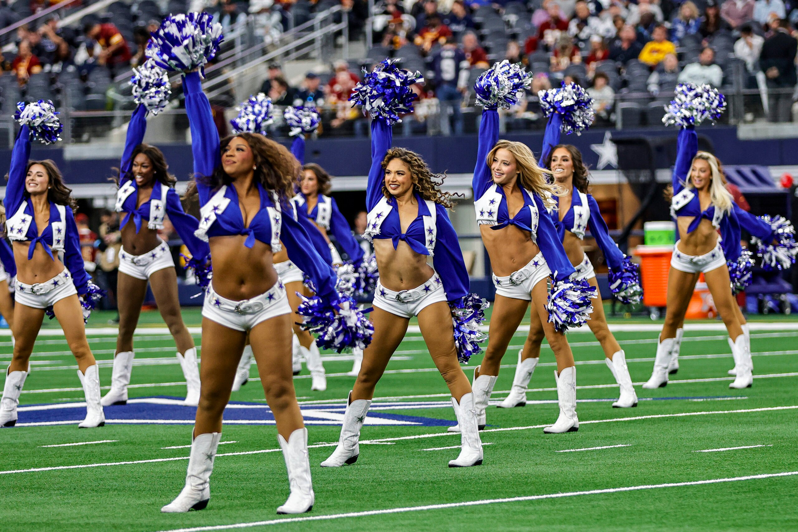 ARLINGTON, TX - JANUARY 05: The Dallas Cowboys Cheerleaders cheer during the game between the Dallas Cowboys and the Washington Commanders on January 5, 2025 at AT&T Stadium in Arlington, Texas. (Photo by Matthew Pearce/Icon Sportswire via Getty Images)