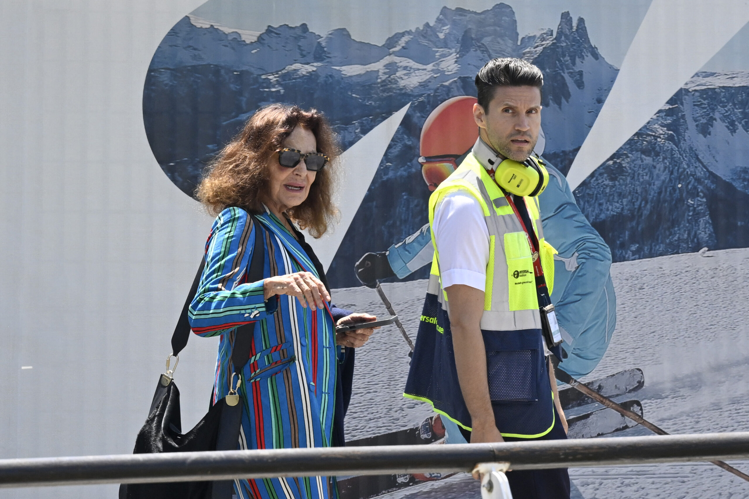 Fashion designer Diane Von Fürstenberg arrives at Venice Marco Polo airport on June 24, 2025. Celebrities in superyachts sail into Venice this week for the three-day wedding party of Amazon tycoon Jeff Bezos and Lauren Sanchez, despite irate locals who say the UNESCO city is no billionaire's playground. The tech magnate and journalist have reportedly invited about 200 guests to their multi-million dollar nuptials in the Italian city, which are expected to kick off on June 26 and end Saturday with a ceremony at a secret location. (Photo by ANDREA PATTARO / AFP) (Photo by ANDREA PATTARO/AFP via Getty Images)