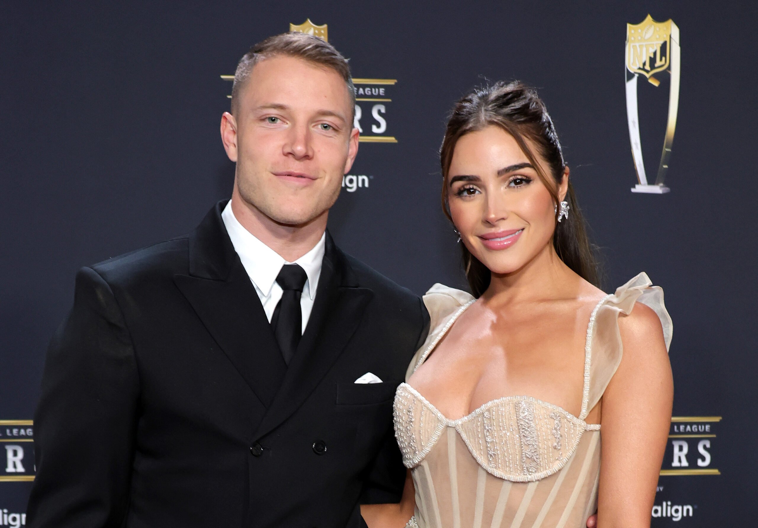 Christian McCaffrey, left, and Olivia Culpo attend the 12th annual NFL Honors at Symphony Hall on Feb. 9, 2023, in Phoenix. (Ethan Miller/Getty Images/TNS)