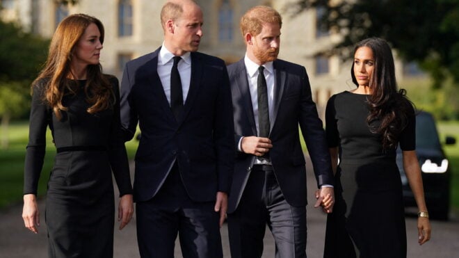 TOPSHOT - (L-R) Britain's Catherine, Princess of Wales, Britain's Prince William, Prince of Wales, Britain's Prince Harry, Duke of Sussex, and Meghan, Duchess of Sussex on the long Walk at Windsor Castle on September 10, 2022, before meeting well-wishers. King Charles III pledged to follow his mother's example of "lifelong service" in his inaugural address to Britain and the Commonwealth on Friday, after ascending to the throne following the death of Queen Elizabeth II on September 8. (Photo by Kirsty O'Connor / POOL / AFP) (Photo by KIRSTY O'CONNOR/POOL/AFP via Getty Images)