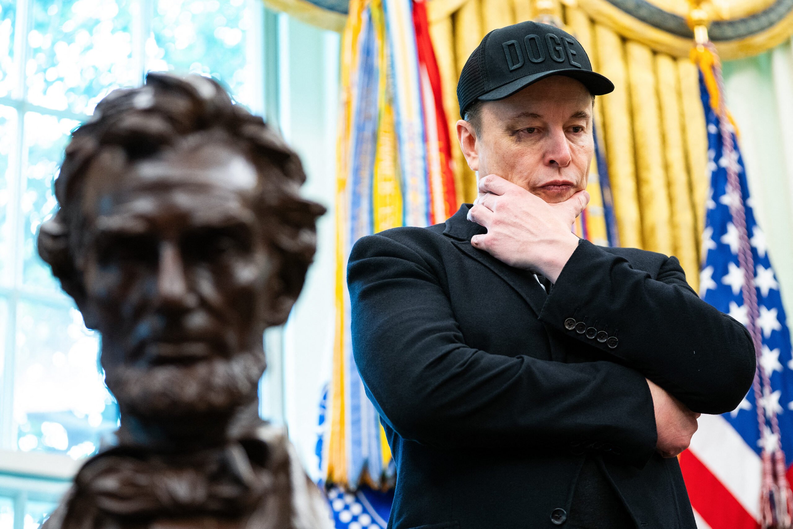 Elon Musk looks on during a news conference with President Donald Trump in the Oval Office of the White House in Washington, D.C., on May 30, 2025. (Allison Robbert/AFP/Getty Images/TNS)