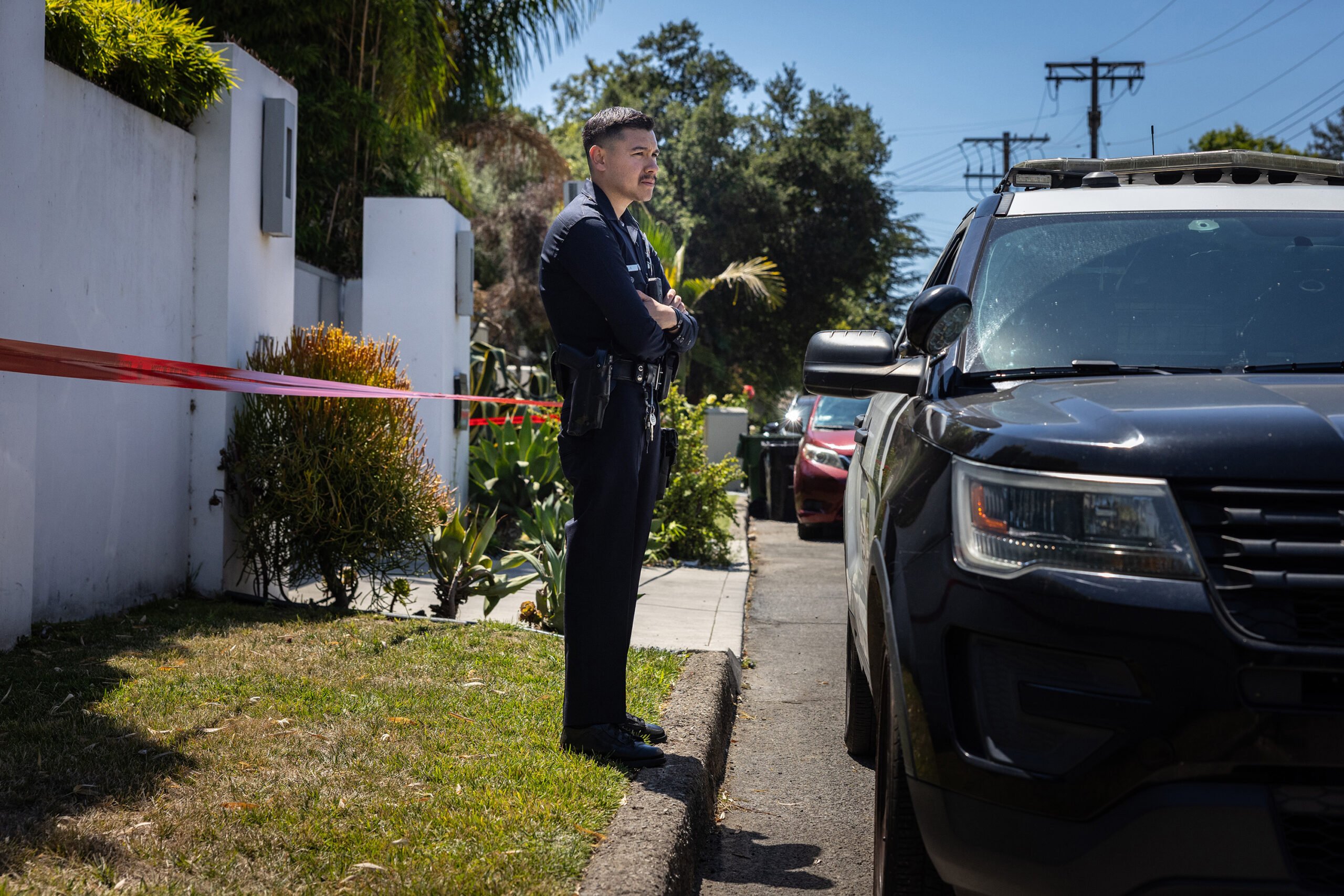 Los Angeles Police Department officials on Tuesday, July 15, 2025, secure the home where Robin Kaye, an "American Idol" music supervisor, and her husband, Thomas Deluca, were found dead in Encino, California. (Jason Armond/Los Angeles Times/TNS)