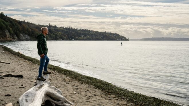 dad walking along washington state beach