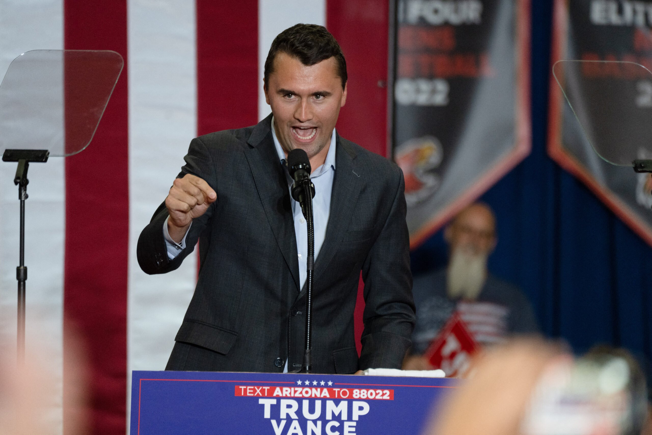 Charlie Kirk, Founder and President of Turning Point USA, addresses the crowd at a rally with US Senator and Republican vice presidential candidate J.D. Vance during a campaign rally at Arizona Christian University Event Center in Glendale, Arizona, on July 31, 2024.