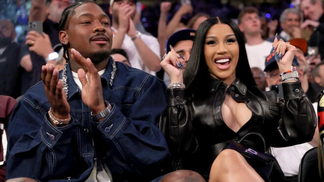 (L-R) NFL Player Stefon Diggs and rapper Cardi B sits court-side during the first quarter in Game Four of the Eastern Conference Second Round NBA Playoffs between the Boston Celtics and the New York Knicks at Madison Square Garden on May 12, 2025 in New York City.