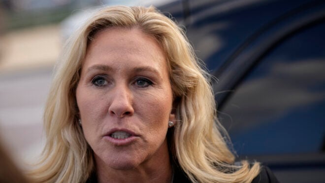 Rep. Marjorie Taylor Greene, R-Ga., speaks to reporters as she leaves the U.S. Capitol after the last House votes of the week on Nov. 17, 2022, in Washington, D.C.