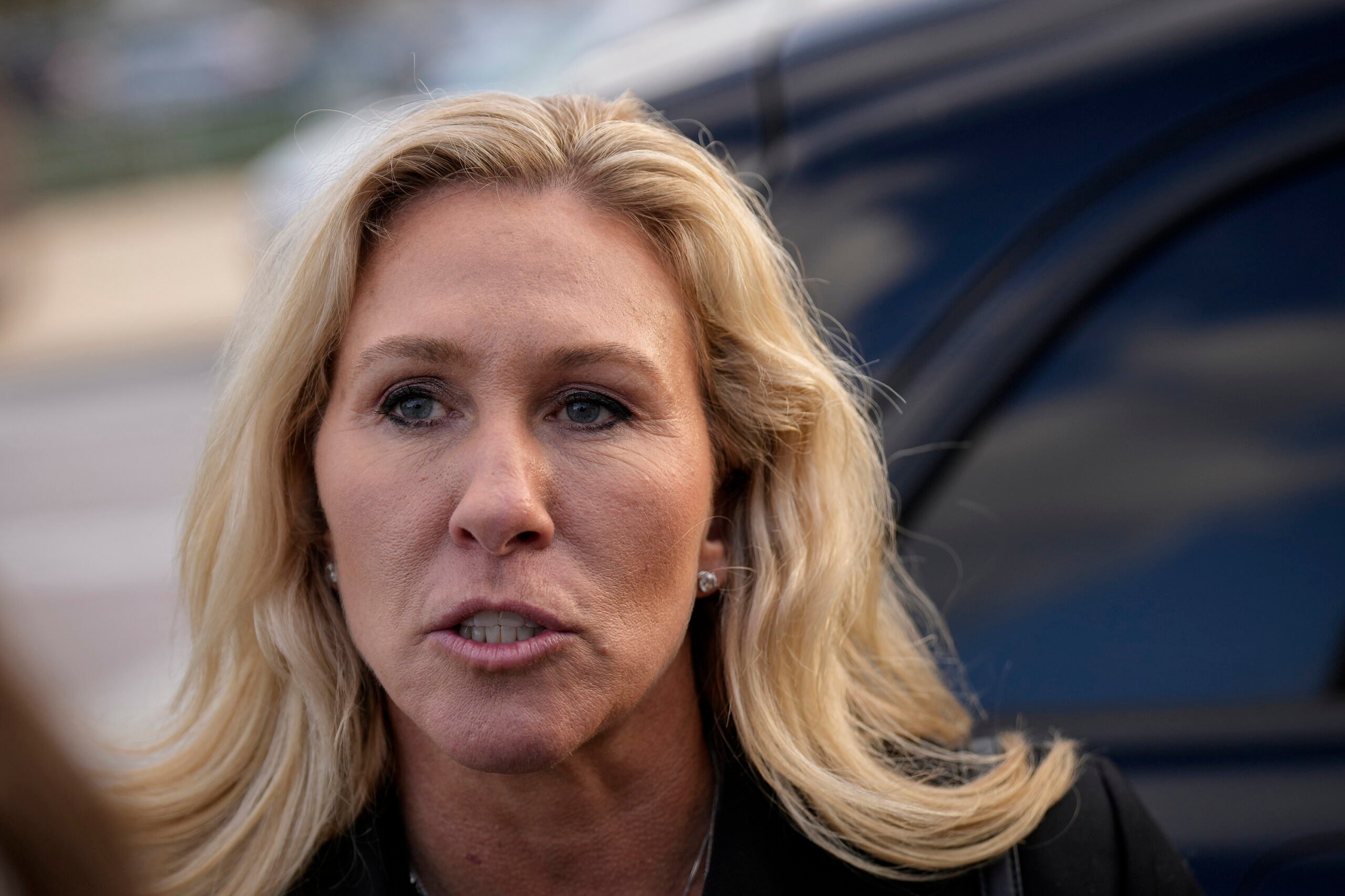Rep. Marjorie Taylor Greene, R-Ga., speaks to reporters as she leaves the U.S. Capitol after the last House votes of the week on Nov. 17, 2022, in Washington, D.C.