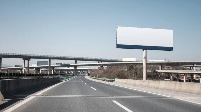 large billboards near the highway transportation hub