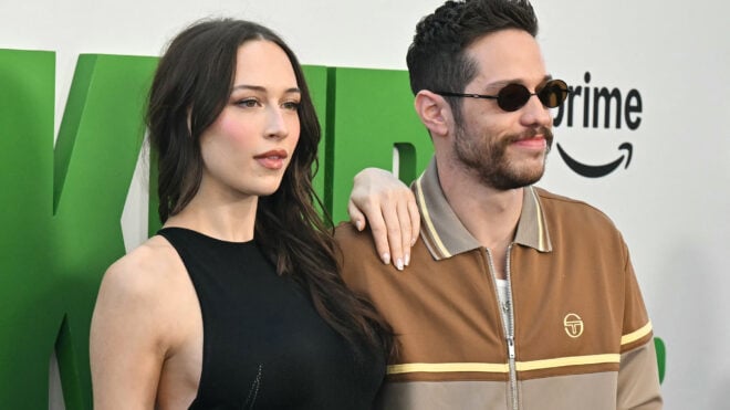 Pete Davidson (right) and girlfriend Elsie Hewitt attend the world premiere of "The Pickup" at the Regal LA Live in Los Angeles on July 27, 2025.