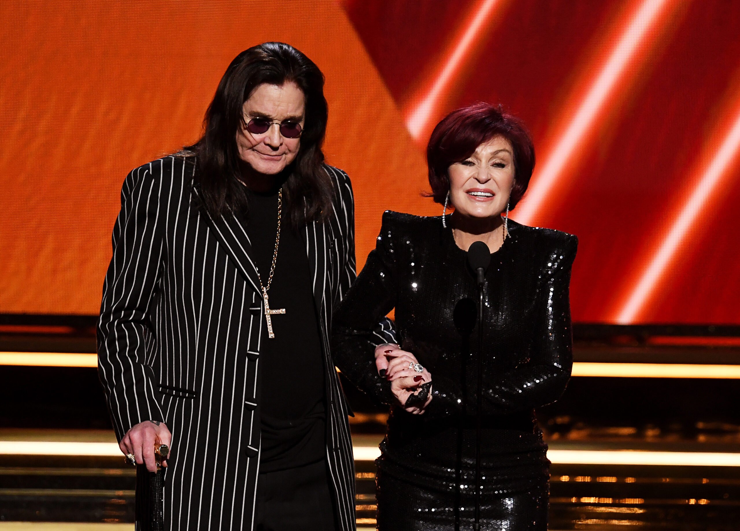 From left, Ozzy Osbourne and Sharon Osbourne speak onstage during the 62nd Annual Grammy Awards at Staples Center on Jan. 26, 2020, in Los Angeles.