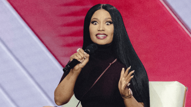 US rapper Nicki Minaj speaks on stage during Turning Point's annual AmericaFest conference in Phoenix, Arizona on December 21, 2025. This year's conference commemorates the late right-wing activist Charlie Kirk, who was fatally shot on a Utah college campus in September, sparking an outpouring of grief among conservatives and prompting President Donald Trump to threaten a crackdown on the "radical left."