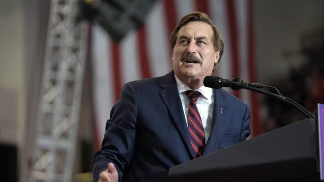 My Pillow CEO Mike Lindell speaks at a Trump-Vance rally at Herb Brooks National Hockey Center in 2024.