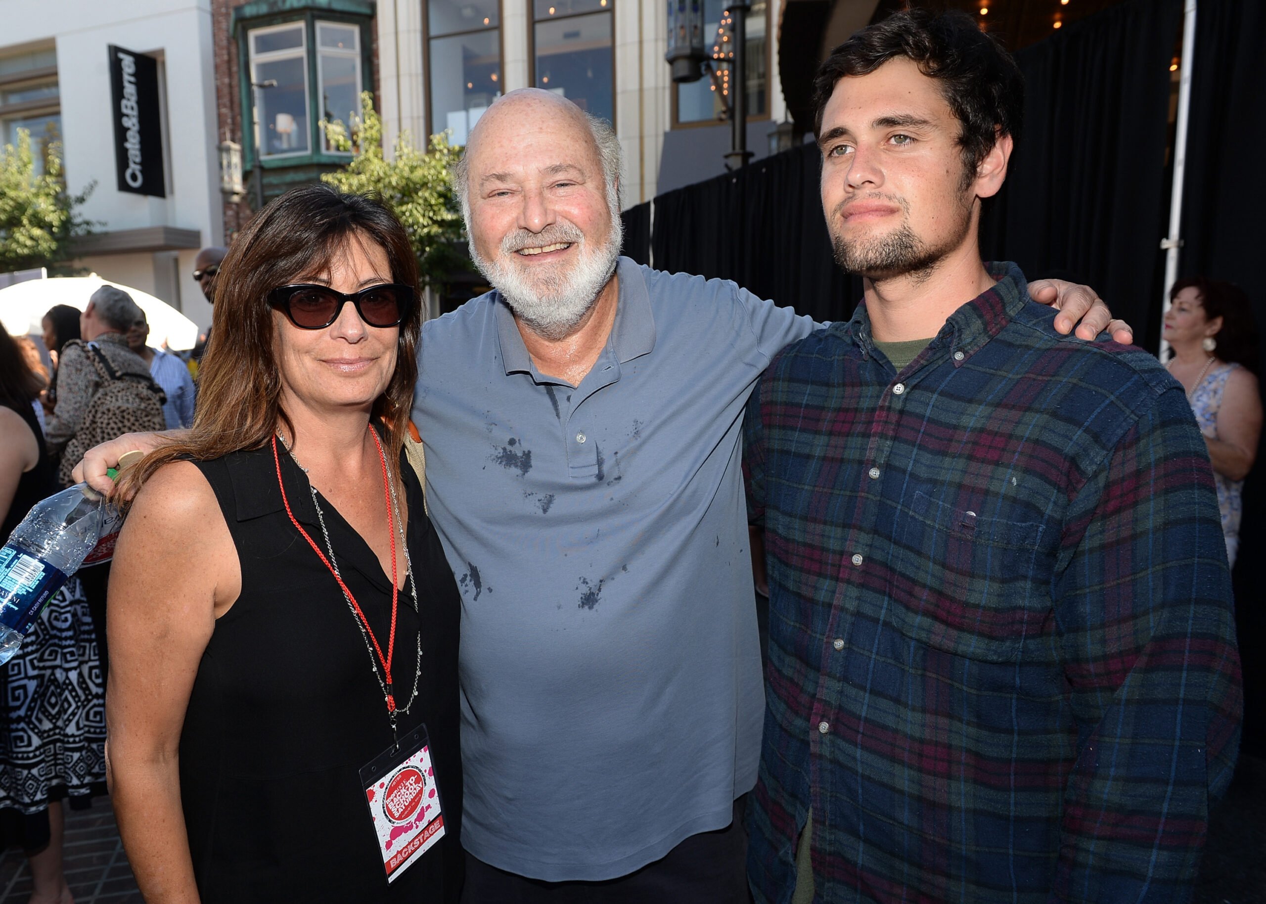 Rob Reiner (center), wife Michele Singer (left) and son Nick Reiner (right) attend Teen Vogue's Back-to-School Saturday kick-off event at The Grove on Aug. 9, 2013, in Los Angeles.