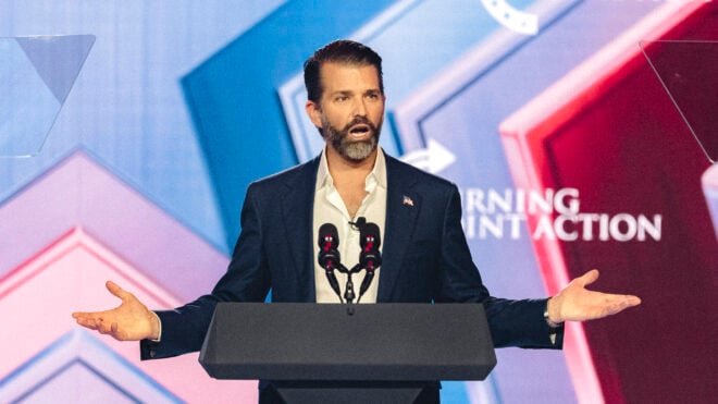 Donald Trump Jr. speaks on stage during Turning Point's annual AmericaFest conference