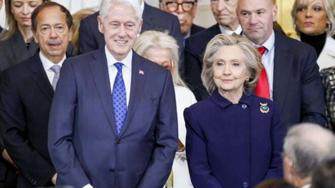 Former President Bill Clinton (left) and former U.S. Secretary of State Hillary Clinton