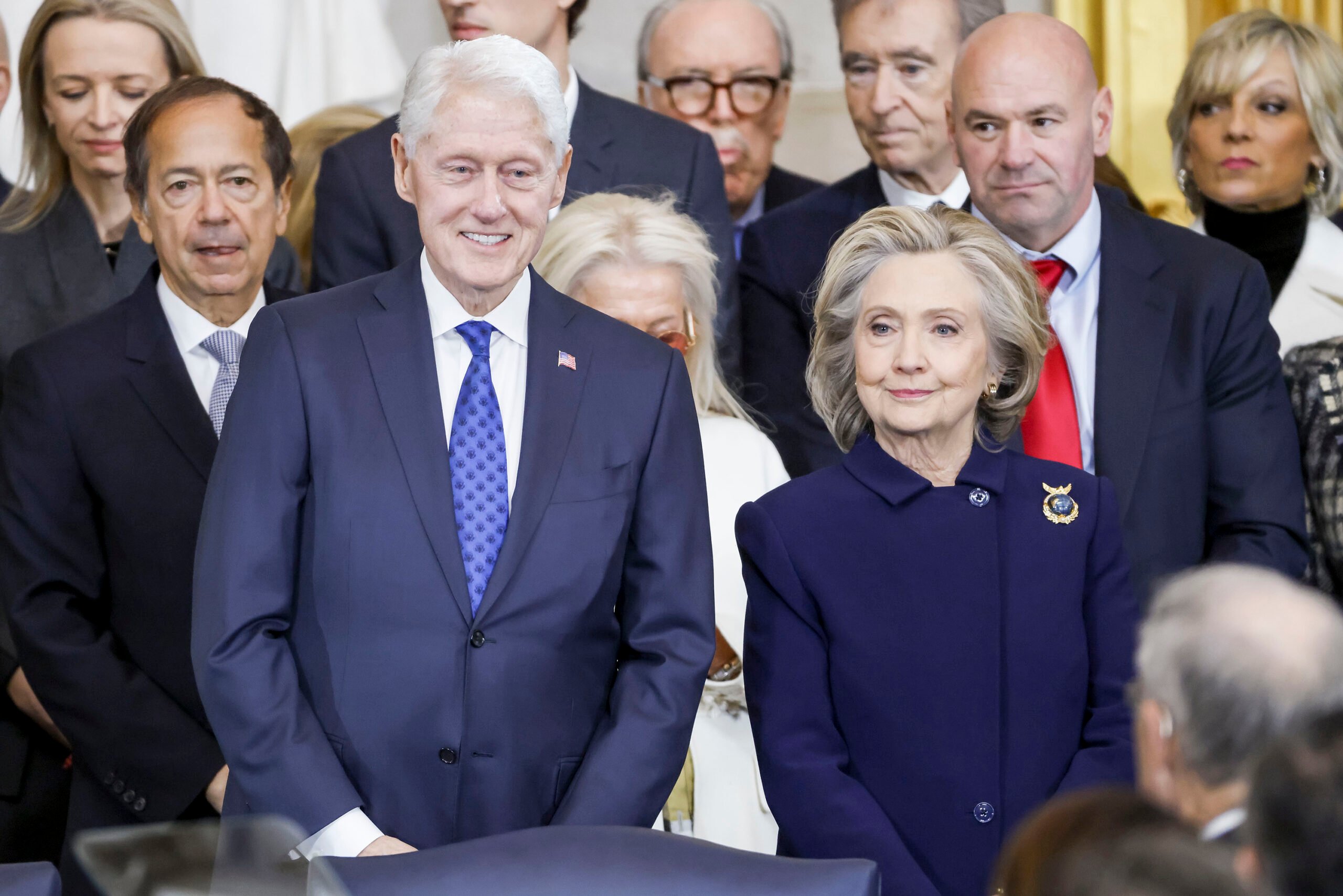 Former President Bill Clinton (left) and former U.S. Secretary of State Hillary Clinton