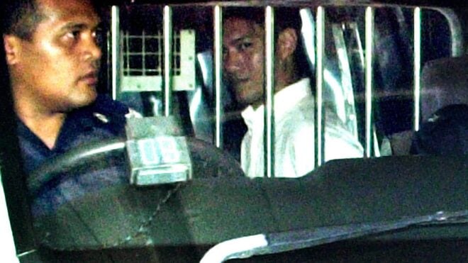 creepy photo Ler being arrested