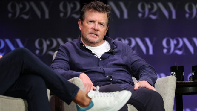 Michael J. Fox speaks onstage