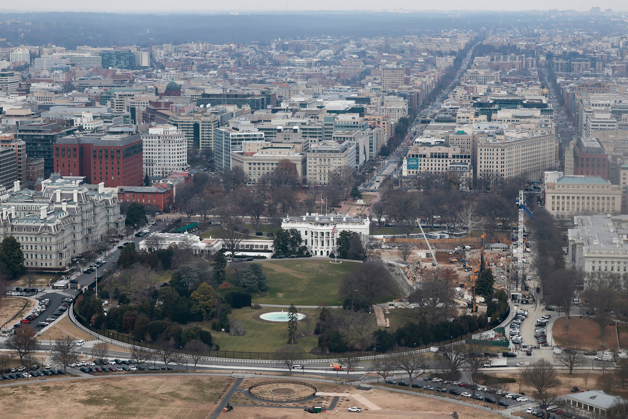 iewed from the observation level of the Washington Monument, demolition work continues where the East Wing once stood at the White House