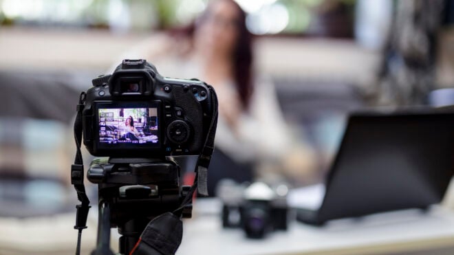 A teacher recording online lessons for photography. Showing various aspects of photography for students.