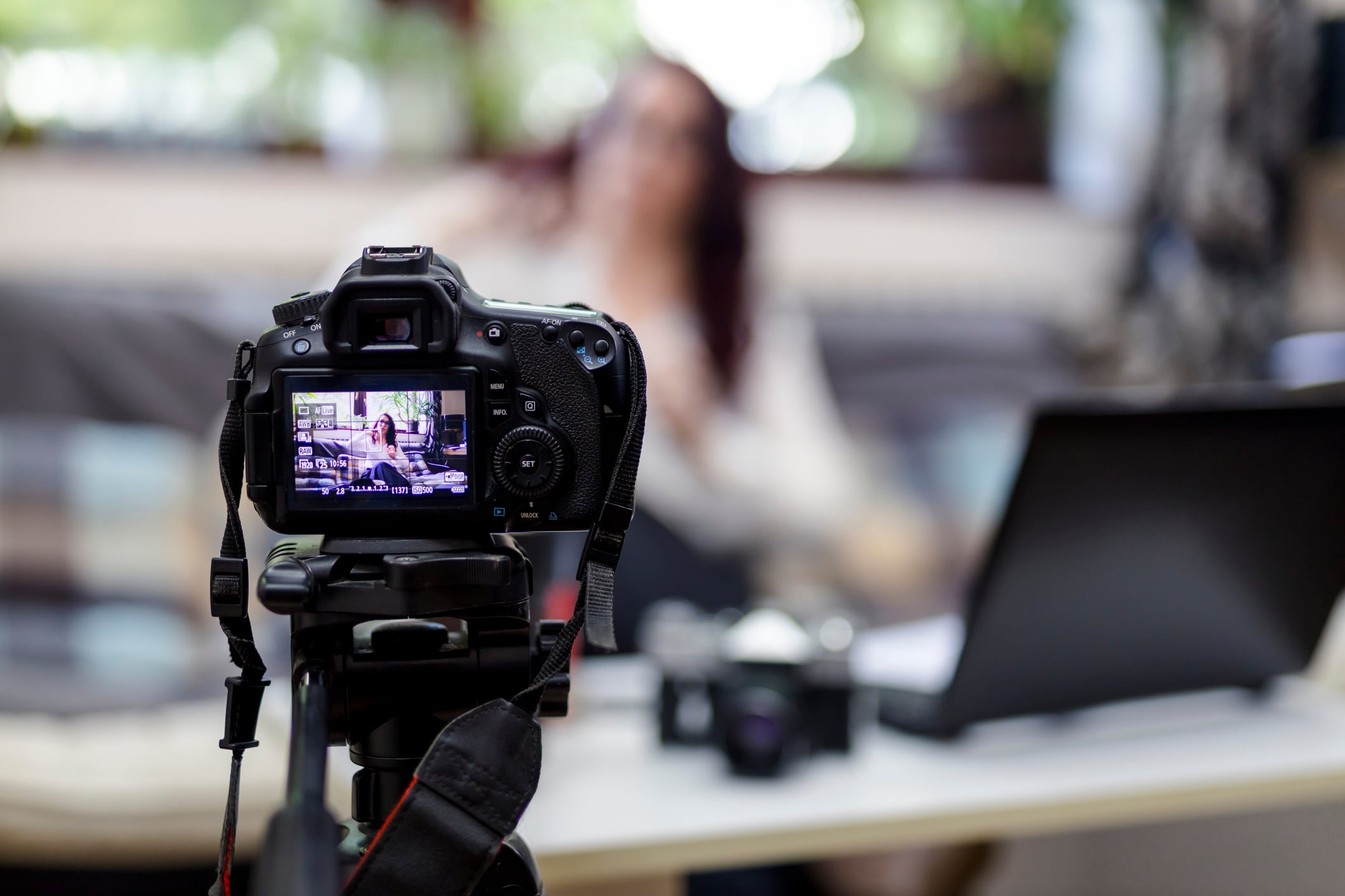 A teacher recording online lessons for photography. Showing various aspects of photography for students.