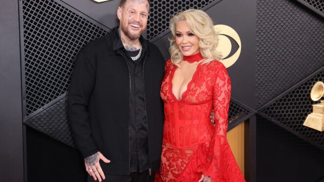 Jelly Roll, left, and Bunnie Xo arrive for the 68th Annual Grammy Awards at Crypto.com Arena in Los Angeles on Feb. 1, 2026.
