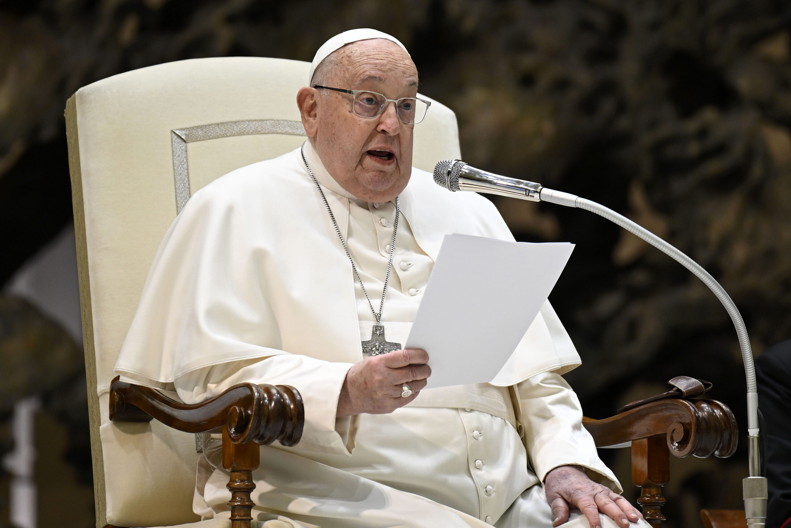 VATICAN CITY, VATICAN - FEBRUARY 12: (EDITOR NOTE: STRICTLY EDITORIAL USE ONLY - NO MERCHANDISING). Pope Francis holds his homily during the weekly General Audience at the Paul VI Hall on February 12, 2025 in Vatican City, Vatican. Pope Francis reiterated his constant appeal for peace, He then mentioned "tormented Ukraine", as he has done at almost every single General Audience since the outbreak of war in the country. "How much it suffers!”, the Pope stressed. (Photo by Vatican Media via Vatican Pool/Getty Images)