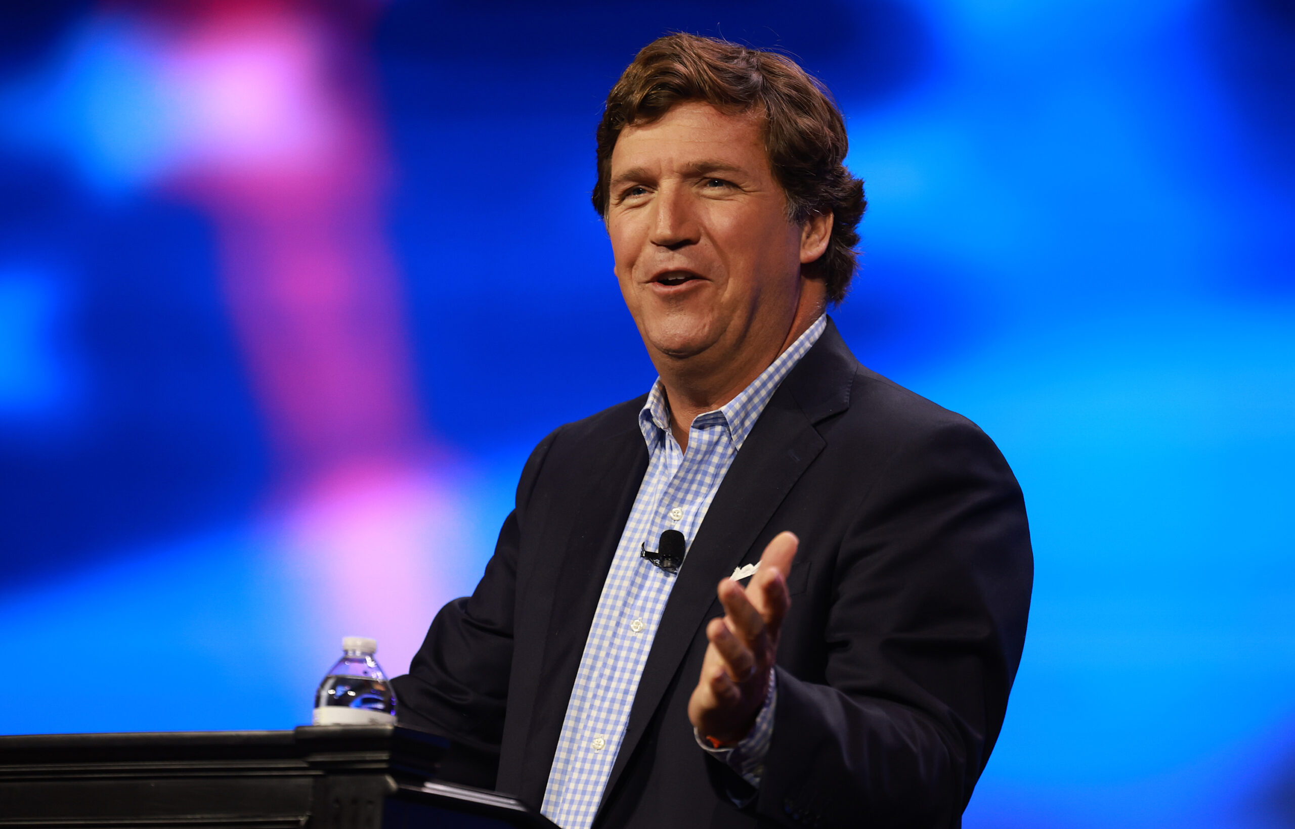 WEST PALM BEACH, FLORIDA - JULY 15: Tucker Carlson speaks at the Turning Point Action conference on July 15, 2023 in West Palm Beach, Florida. Trump is scheduled to speak at the event held in the Palm Beach County Convention Center. (Photo by Joe Raedle/Getty Images)